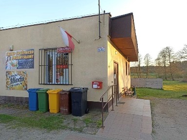 Działka budowlana z budynkiem 12 ar