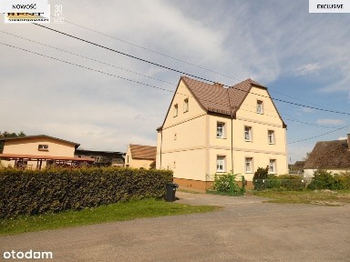 Solidny duży dom w otoczeniu bujnej zieleni !