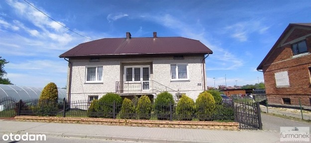 Dom z bud. gospodarczymi w miejscowości gminnej