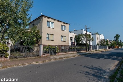 Dom z dużym ogrodem i dwoma lokalami usługowymi