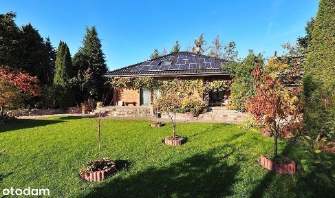 Dom na urokliwej działce z stawem