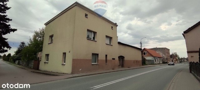 Dom przy głównej ul. Skorogoszczy z dużą działką