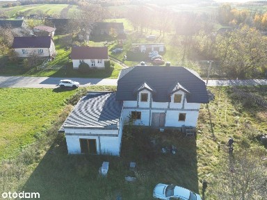 Duża działka 6300m2 z nowym domem do wykończenia.