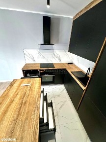 W nowym budynku mieszkanie z Mp i komórką!