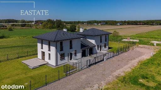 Bliźniaki połączone garażem z działką 500 m2