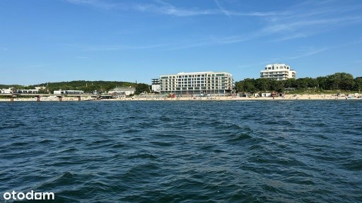 Widok bezpośrednio na plażę i molo Międzyzdroje