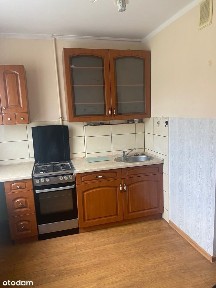 Mieszkanie na parterze z balkonem, miejscem parkingowym i garażem