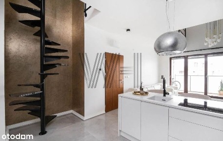 Dwupoziomowy przestrzenny apartament z antresolą