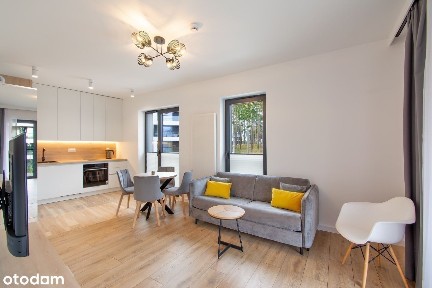 Narożne apartament z dużym balkonem oraz miejscem w hali garażowej