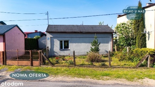 dom wolnostojący z ziemią rolną