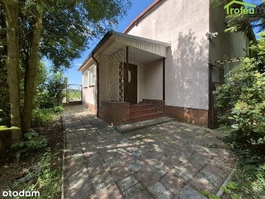 Dom z dużą zagospodarowaną działką