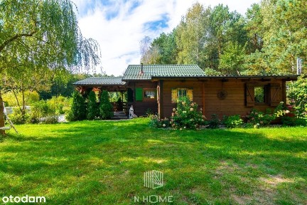 Twój Azyl w Sercu Lasu - Dom ze Stawem na Sprzedaż