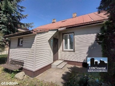 Drewniany dom w centru Łap, ul. Spółdzielcza 13, ładna działka