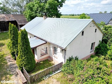 Dom wraz z budynkami na działce 5000 m2