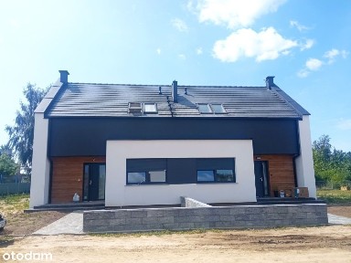 Z pompą ciepła na działce 440m2 Nowa