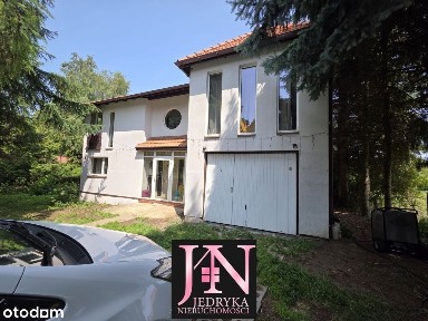 Dom wolnostojący z garażem na 17 arowej działce z
