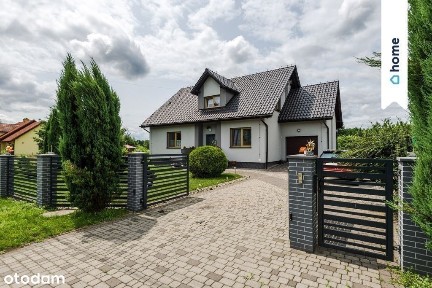 Funkcjonalny dom z ładnym ogrodem czeka na Ciebie