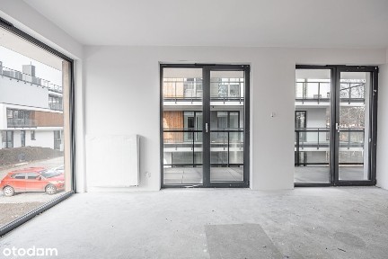 Dwupoziomowy apartament z ogródkiem