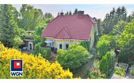 Dom z bajecznym ogrodem i garażem na 5 aut