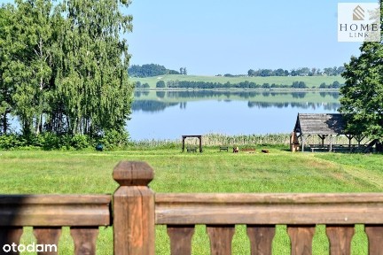 Olsztyn, dom z bala z linią brzegową