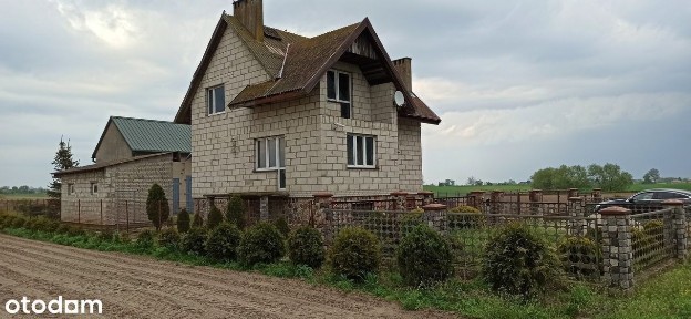 Dom jednorodzinny z bud. garażowo-magazynowymi