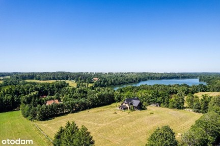 Dom z potencjałem w otoczeniu jeziora i lasu