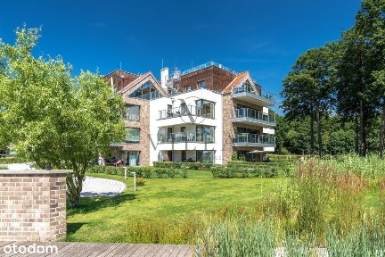 Apartament z ogrodem i widokiem na jezioro