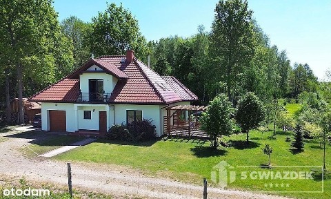 Piękna posiadłość przy jeziorze, las i stawy.
