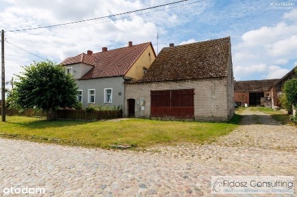 Dom z zabudowaniami w Kolsku
