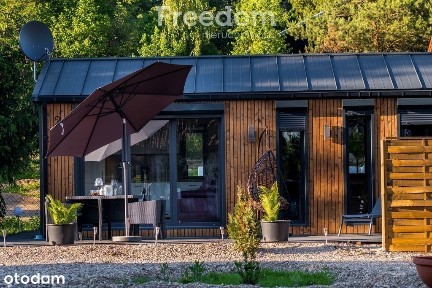 Domek w malowniczej scenerii jezior i lasów. Lutek