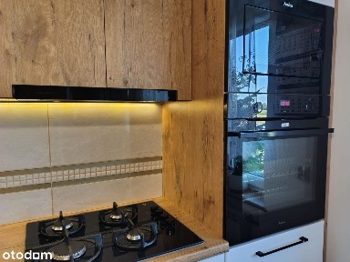 Mieszkanie z ogrodem, garażami, piwnicą,pomieszczenia gospodarcze