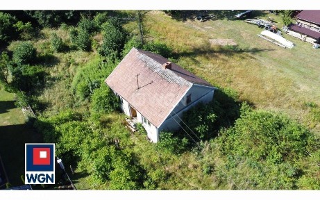 Działka zabudowana 32 ary