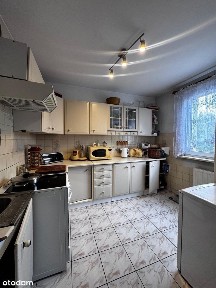 Mieszkanie z działką i garażami.