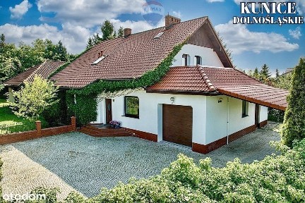 Dom z krytym basenem i pięknym ogrodem!