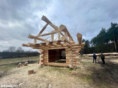 Dom z bala naturalnego nad jeziorem