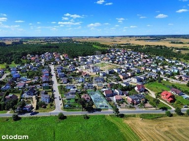 Funkcjonalny dom z dodatkową zabudową