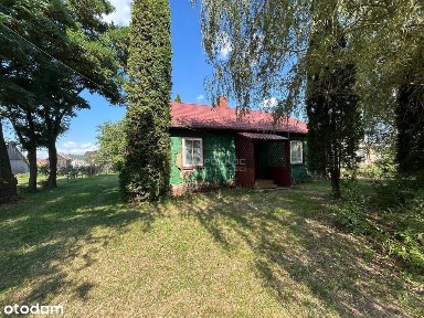 Dom drewniany z działką 3490m² - Olszewnica