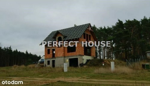 Dom dwurodzinny na wzgórzu między dwoma jeziorami