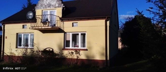 Dom z budynkami gospodarczymi