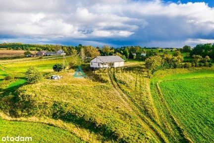 Działka z rozpoczętą budową domu w Ciemnie