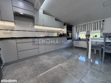 Dom z dwoma niezależnymi mieszkaniami i warsztatem