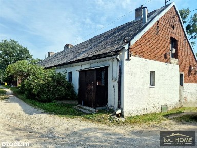 Lokal mieszkalny z działką i pom. gospod.