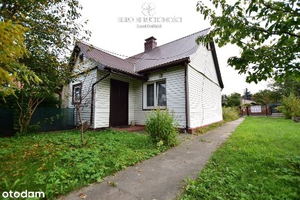 Dom z działką 672 m² i budynkiem gospodarczym
