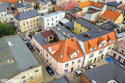 Kamienica: mieszkania, 2 lokale usługowe, 3 garaże