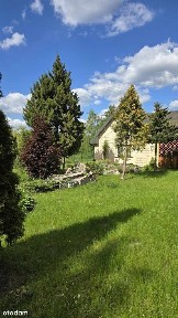 Dom w kameralnym otoczeniu przyrody