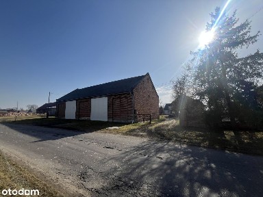 Duża działka 36 arów z dwoma domami i zabudowaniami