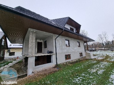 Dom do remontu z domkiem drewnianym oraz garażem