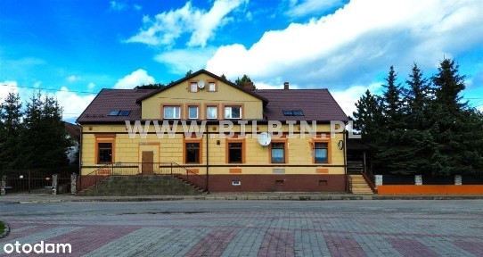 Budynek mieszkalno-usługowy z garażami i altaną !