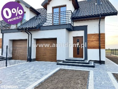 Nadbiel,dom w zabudowie bliżniaczej z garażem