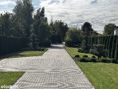 Przestronny dom w zielonej okolicy który szepcze ciszą…